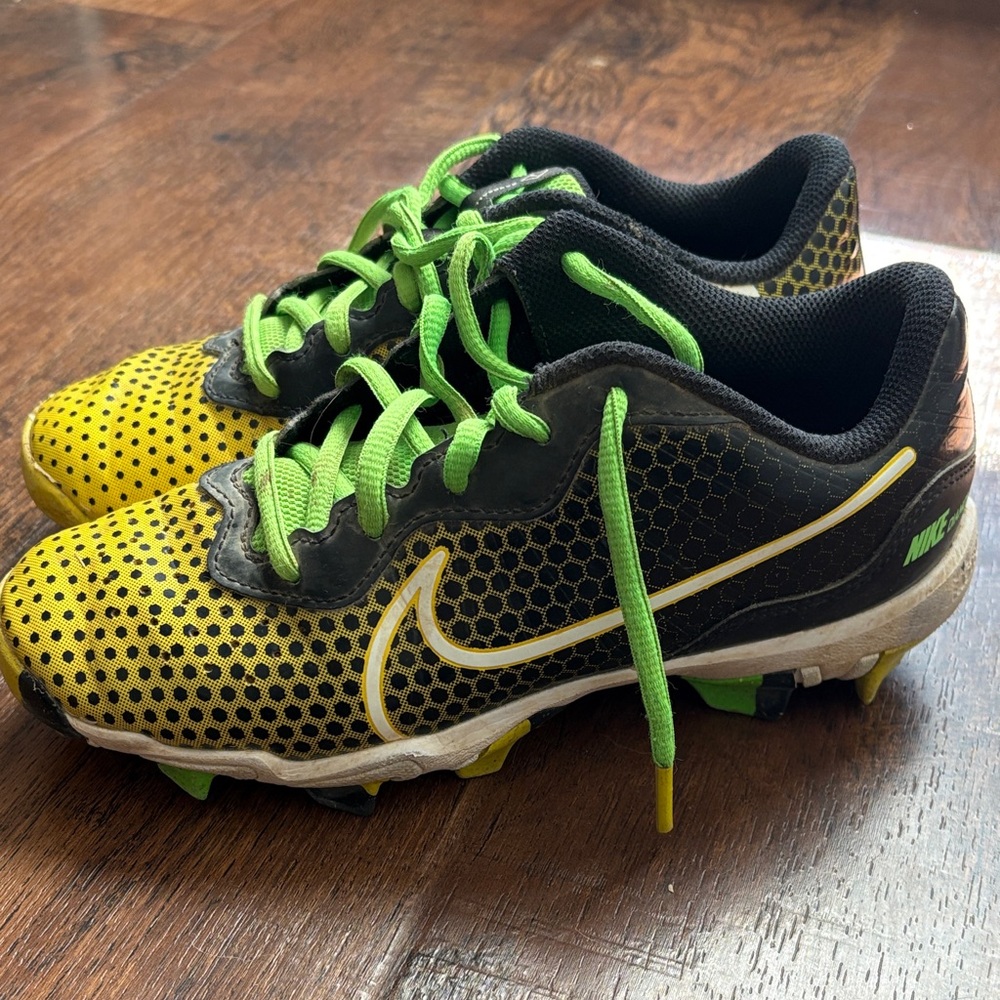 Nike Kids Black and Yellow Baseball cleats.